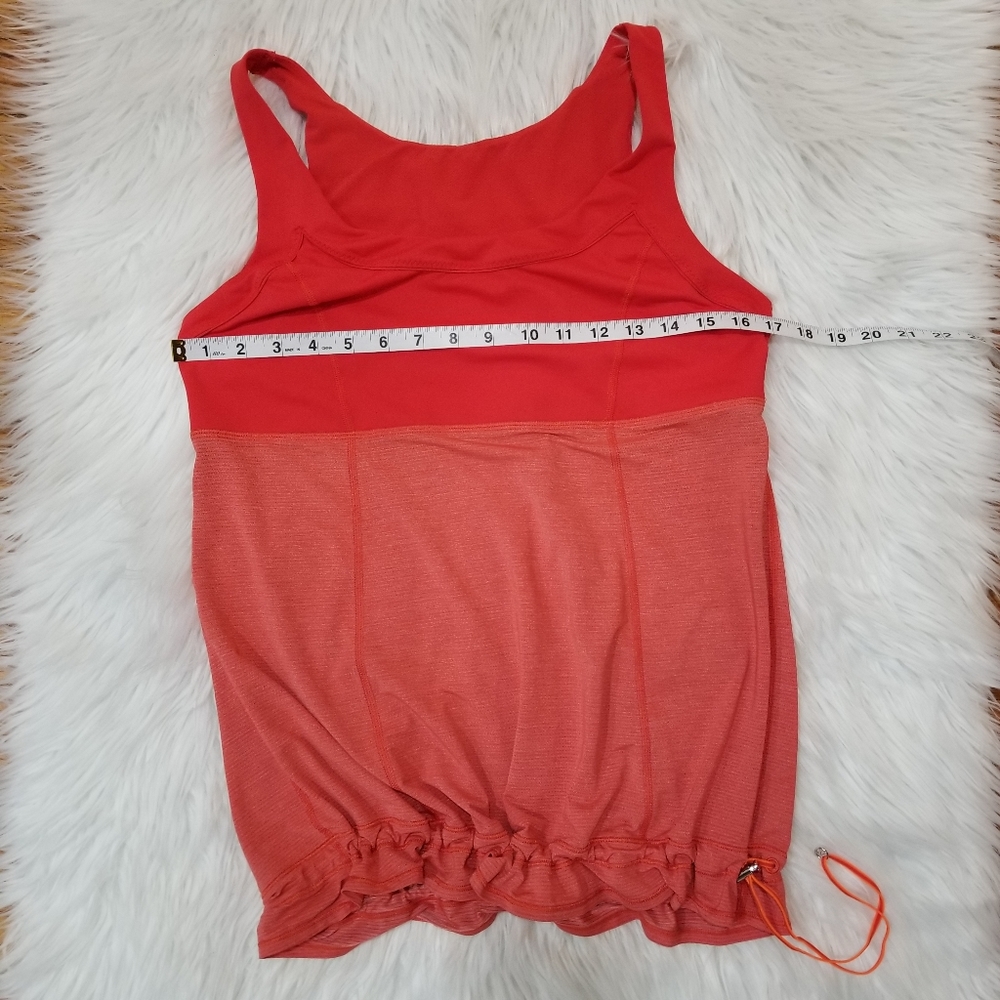LULULEMON Tank Top Orange Red Color, Adjustable at the bottom SIZE M/L...